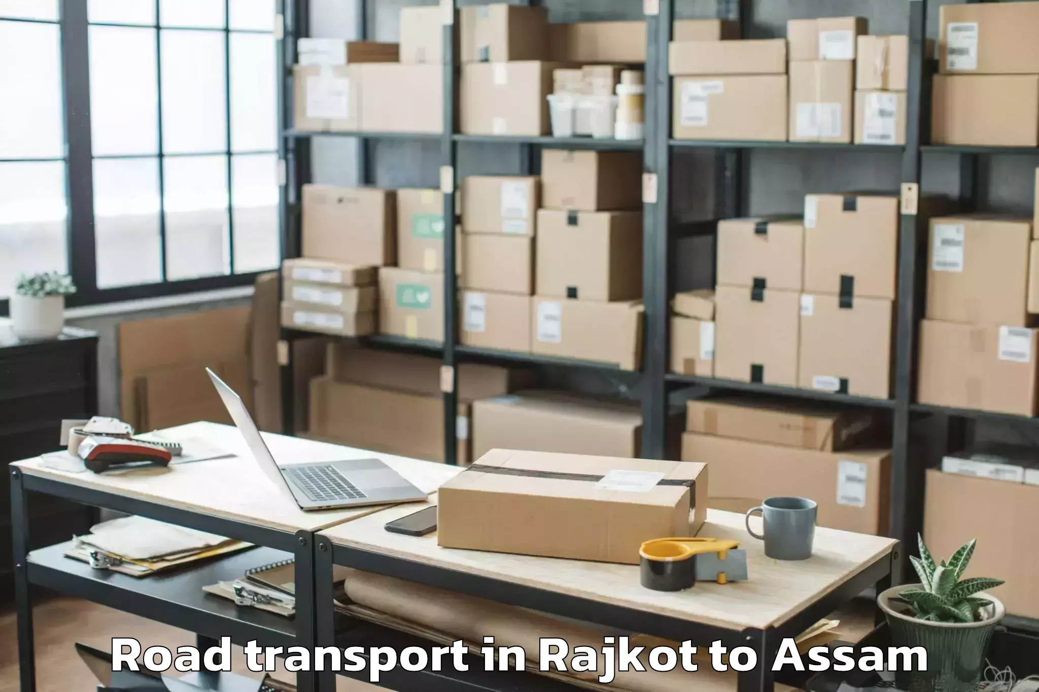 Expert Rajkot to Jogighopa Road Transport